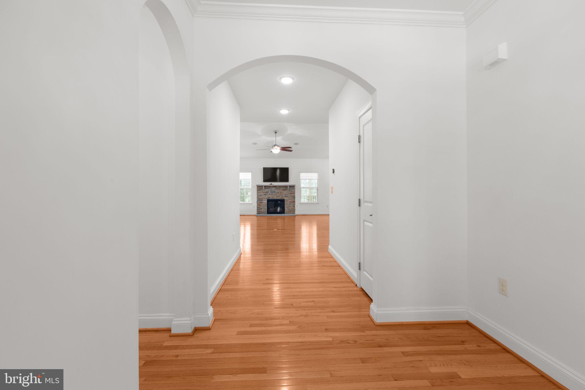 400 Telegraph Road Stafford, VA 22554 - Photo 26 of 79 a view of a hallway with wooden floor