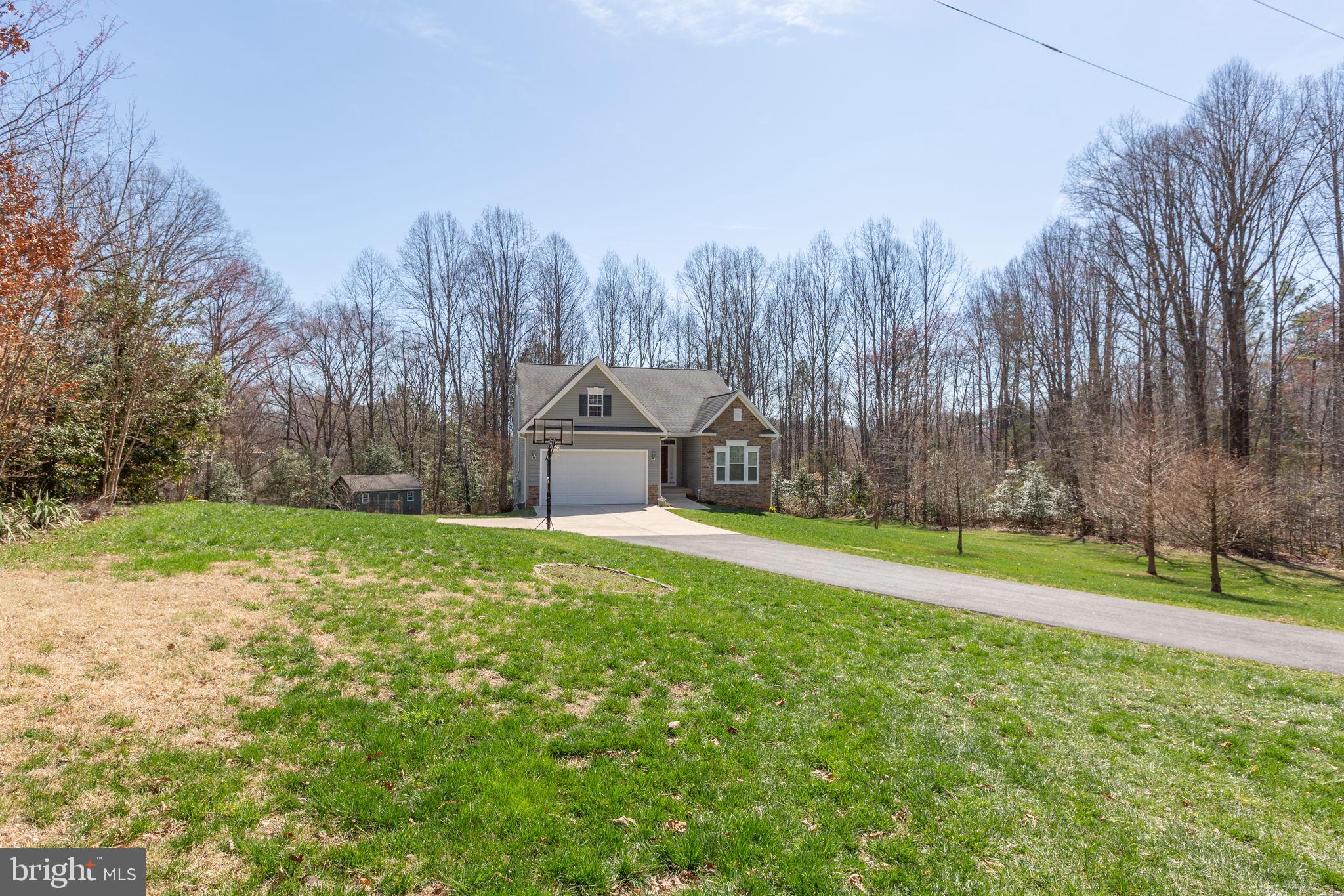 400 Telegraph Road Stafford, VA 22554 - Photo 39 of 79 a view of a backyard with large trees