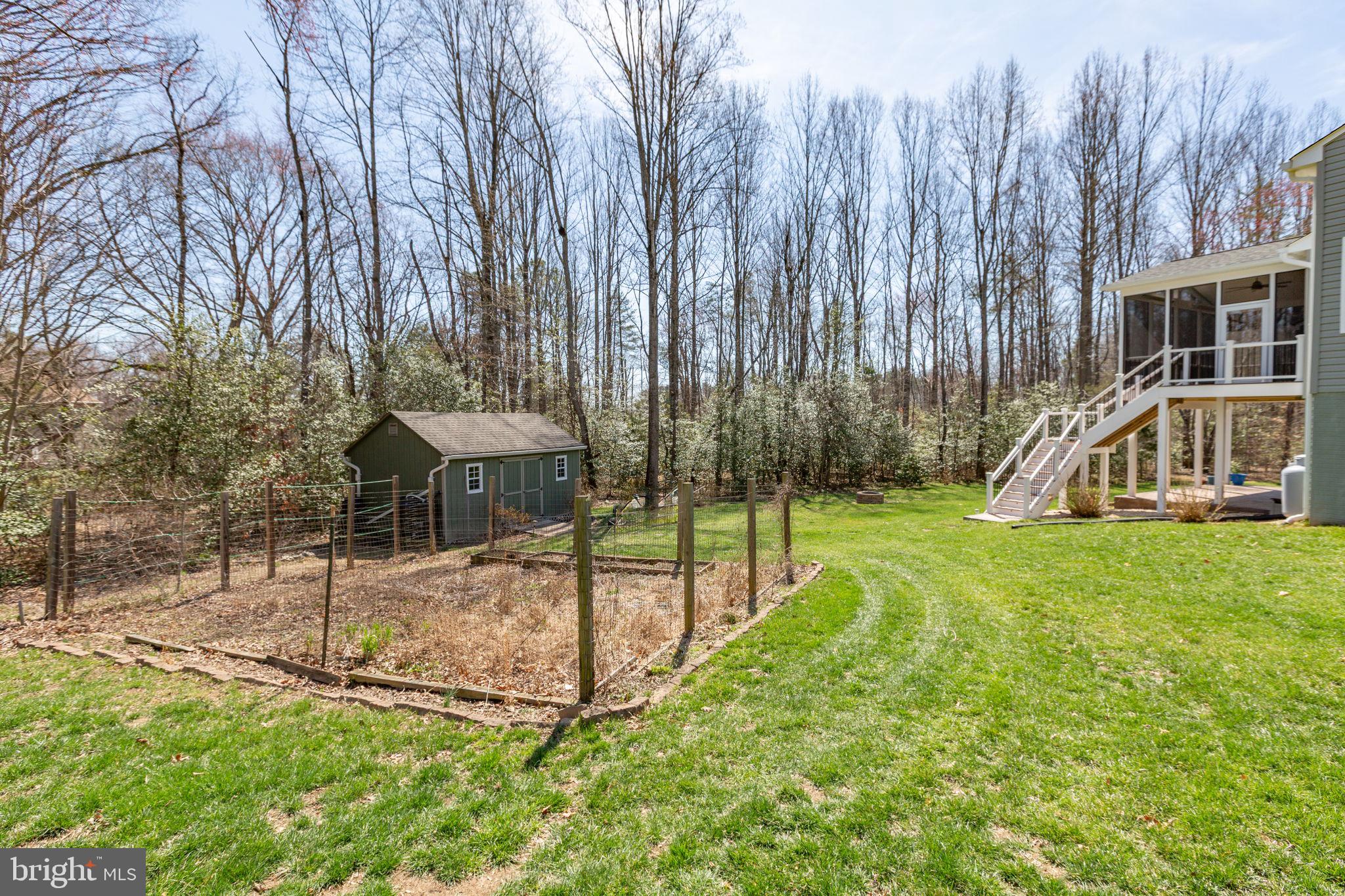 400 Telegraph Road Stafford, VA 22554 - Photo 42 of 79 a view of a house with backyard and a slide