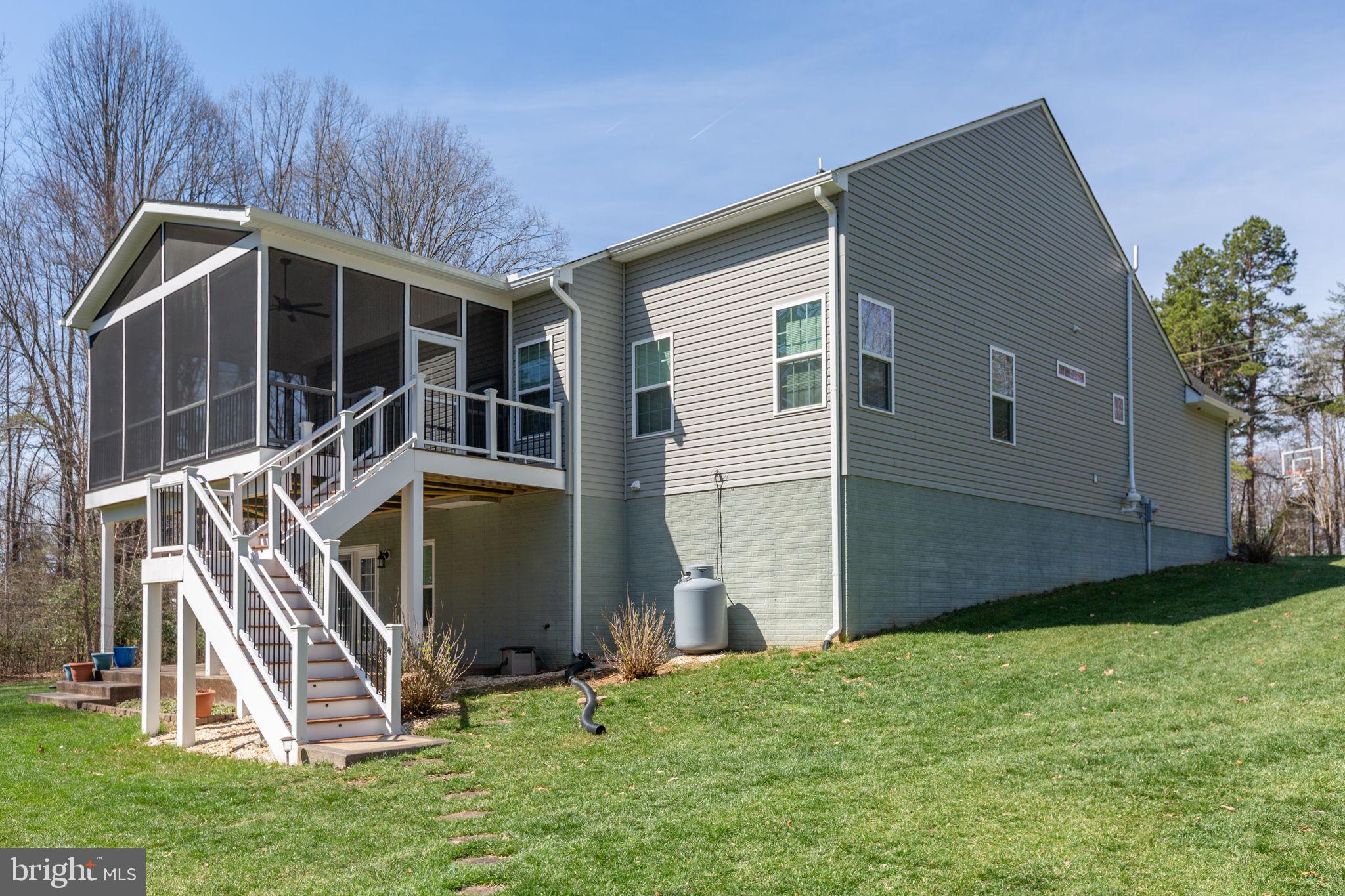 400 Telegraph Road Stafford, VA 22554 - Photo 45 of 79 a front view of a house with a yard