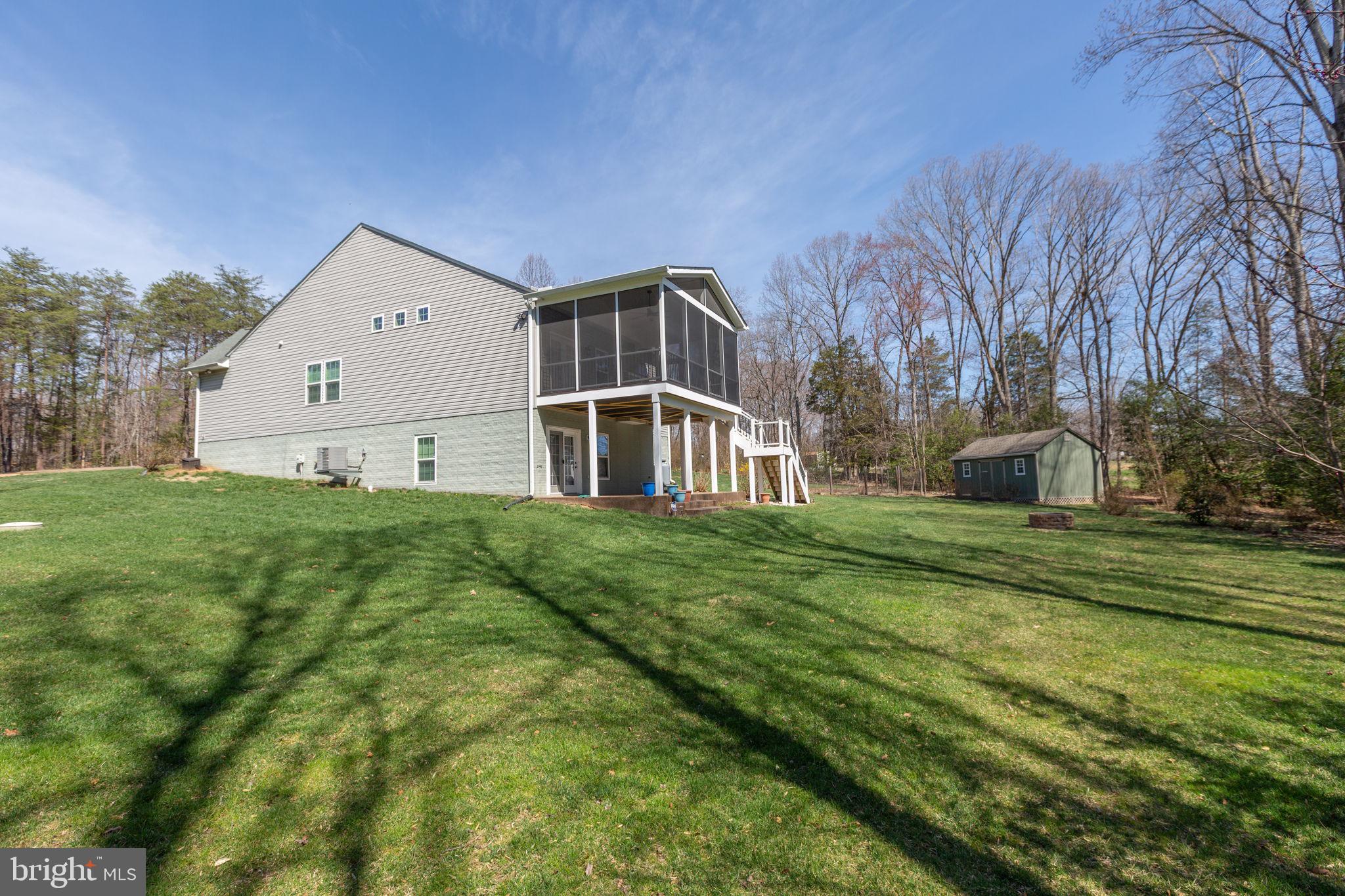 400 Telegraph Road Stafford, VA 22554 - Photo 48 of 79 a front view of house with yard and green space