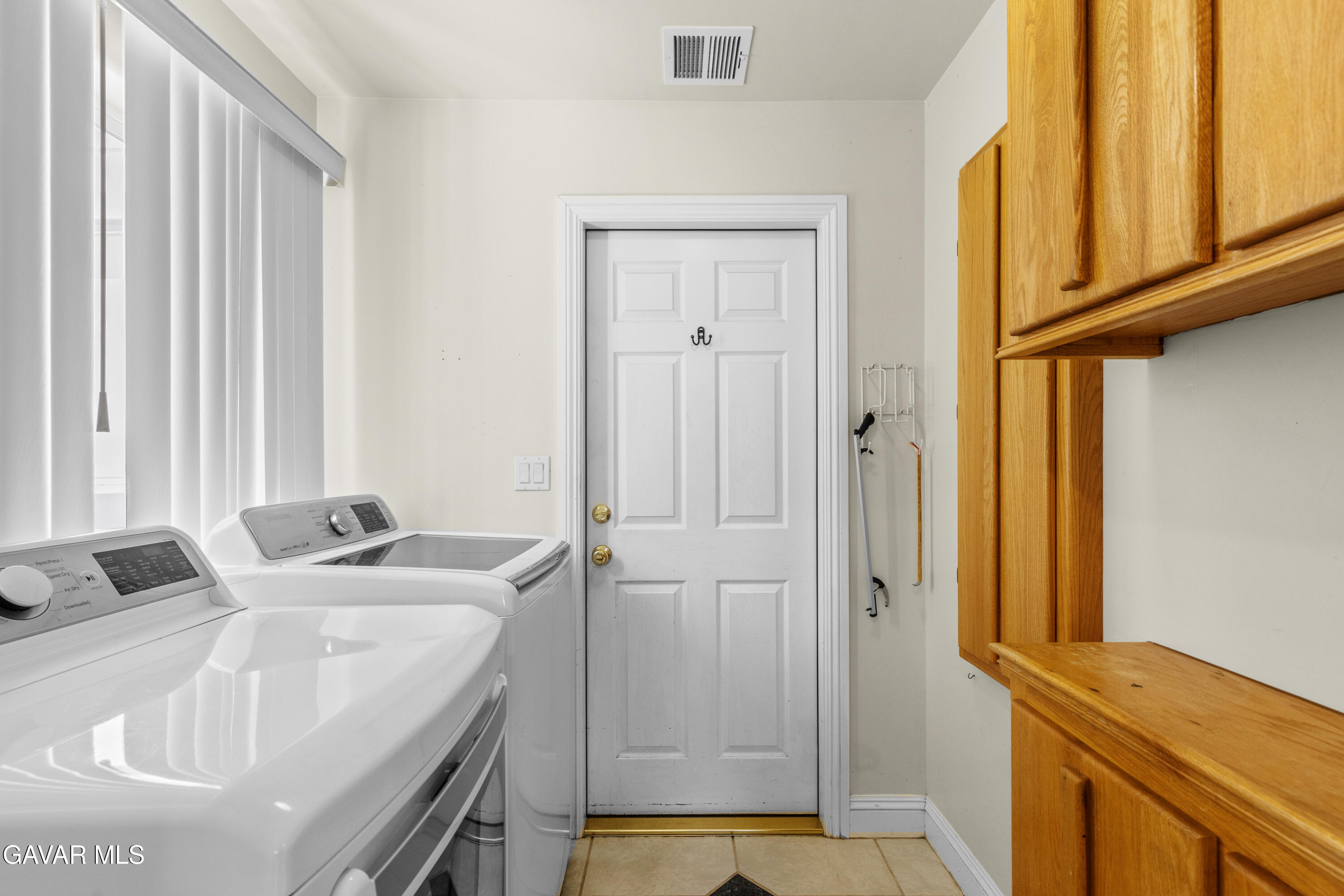 30100 Sunland Way Tehachapi, CA 93561 - Photo 14 of 44 a bathroom with a sink and a tub