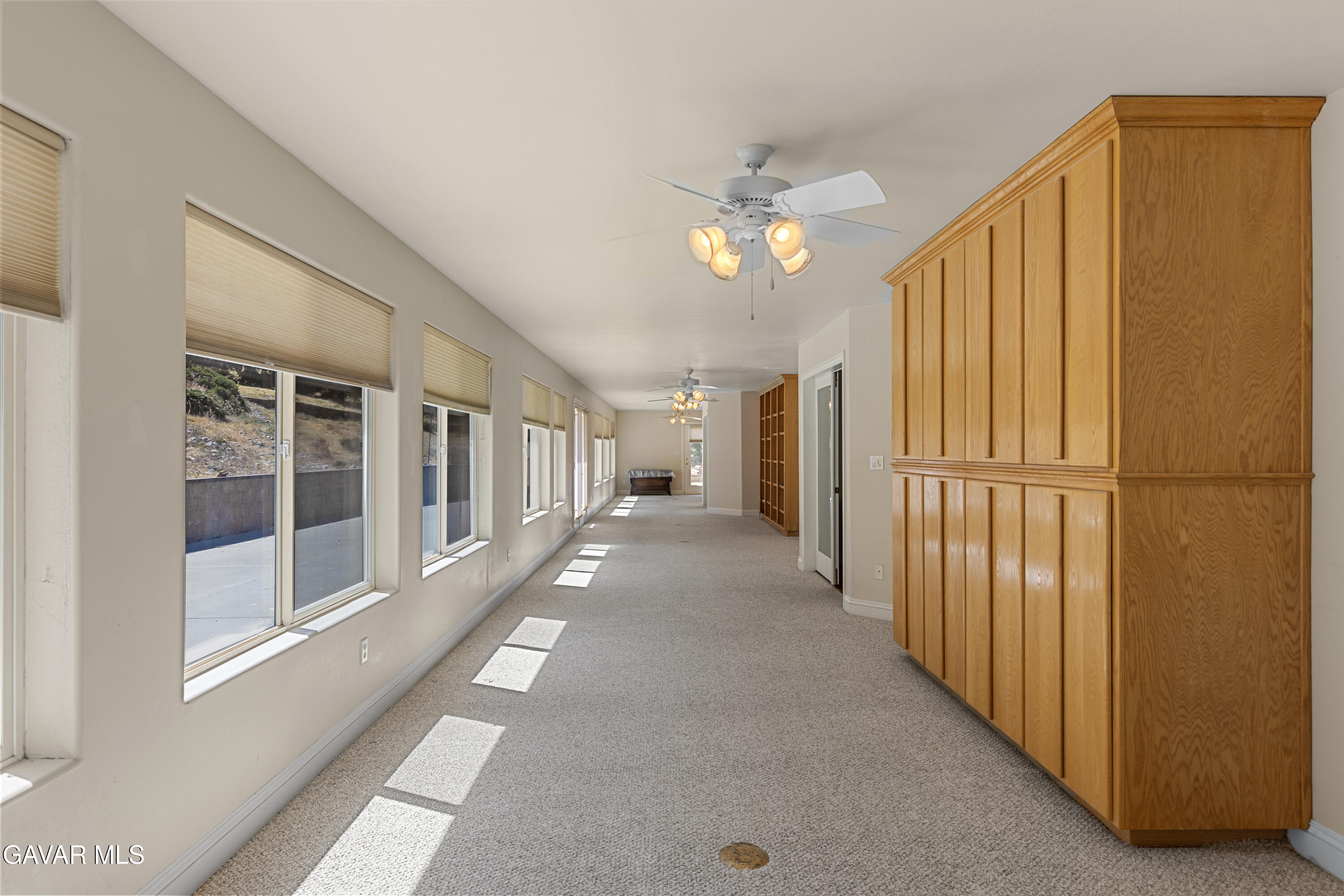 30100 Sunland Way Tehachapi, CA 93561 - Photo 18 of 44 a view of a hallway with windows