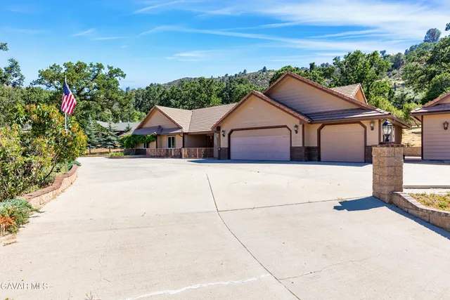 a house view with a outdoor space