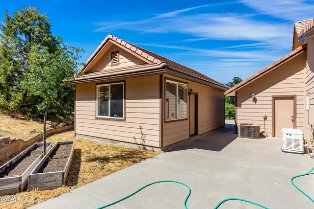 a view of house with a outdoor space