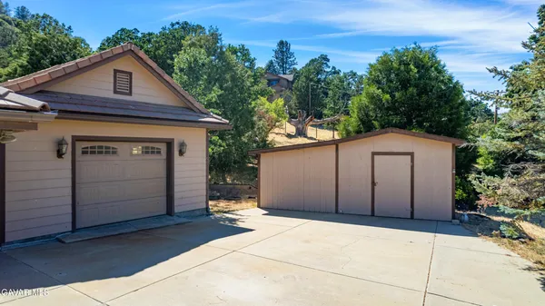 a front view of a house with a garage