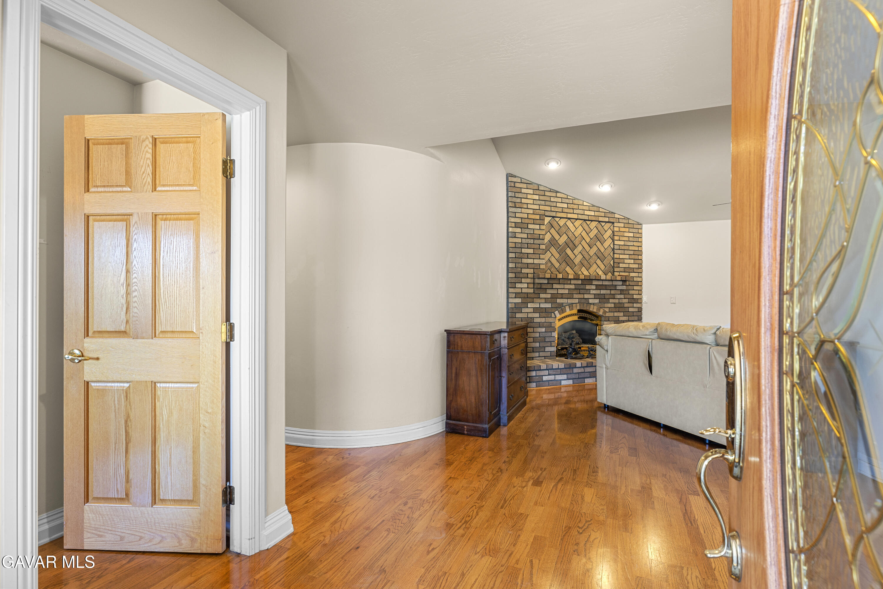 30100 Sunland Way Tehachapi, CA 93561 - Photo 4 of 44 a view of a kitchen with a fridge and wooden floor