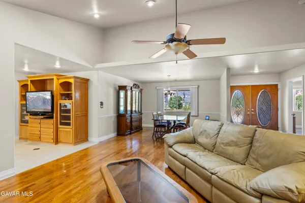 a living room with furniture and window