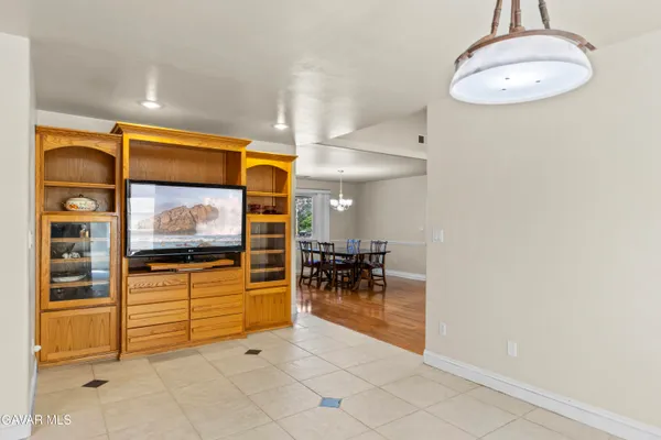 a view of living room with furniture and window