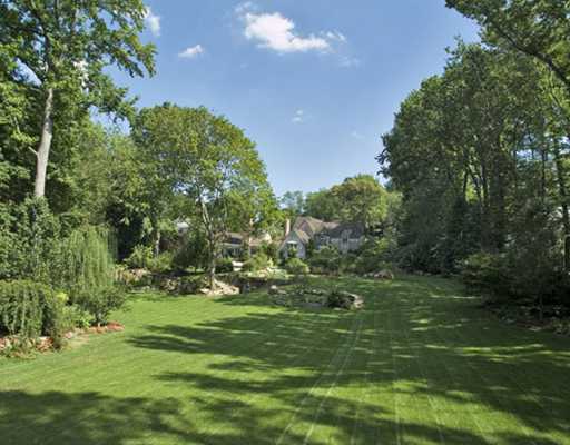 Undisclosed Address Greenwich, CT 06830 - Photo 3 of 10 a big yard with lots of green space and plants