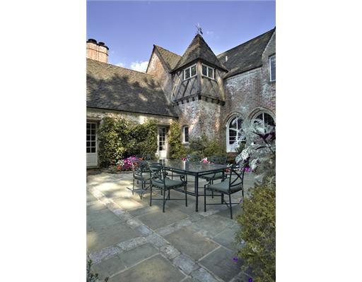 Undisclosed Address Greenwich, CT 06830 - Photo 5 of 10 a view of a patio with a table and chairs