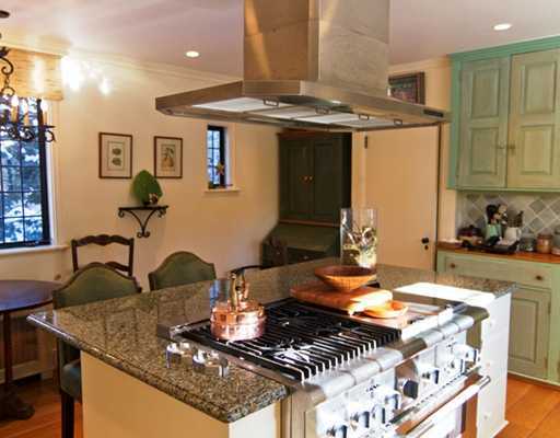 Undisclosed Address Greenwich, CT 06830 - Photo 7 of 10 a kitchen with a stove and a sink