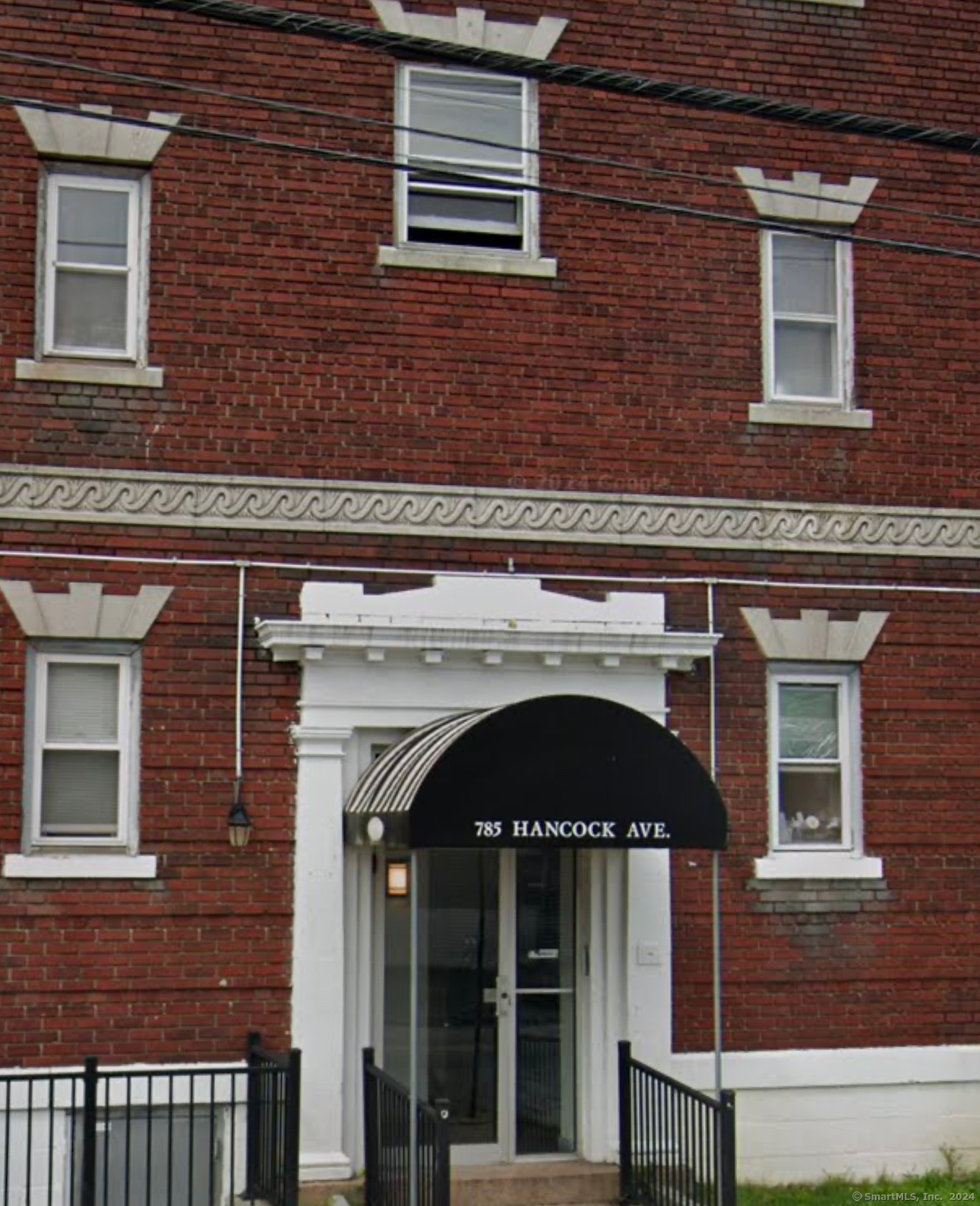 1599 Fairfield Avenue, Unit 785 Bridgeport, CT 06605 - Photo 2 of 2 a front view of a house with plants