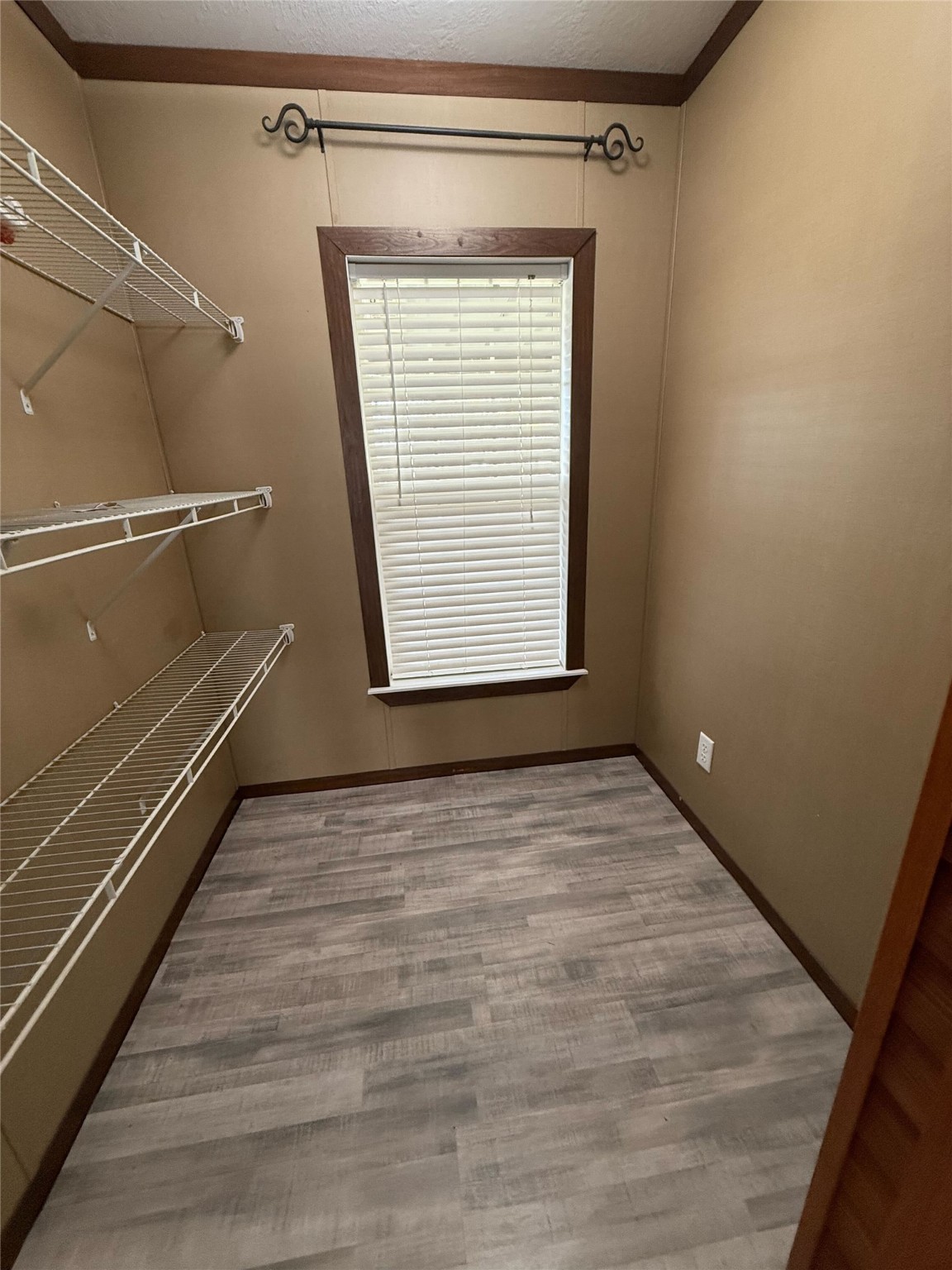 181 Janning Street Coldspring, TX 77331 - Photo 22 of 49 a view of an empty room with a window