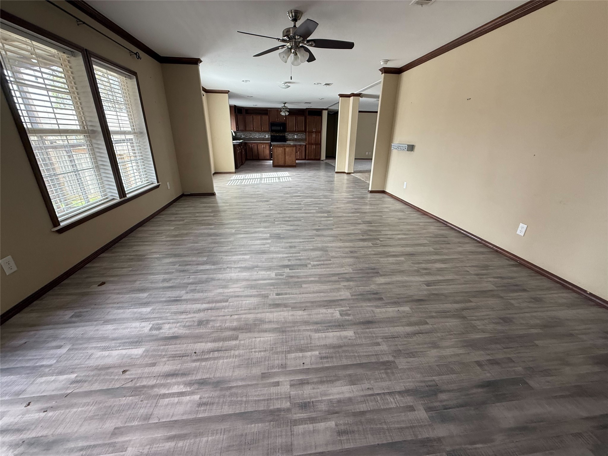 181 Janning Street Coldspring, TX 77331 - Photo 29 of 49 wooden floor in an empty room with a window