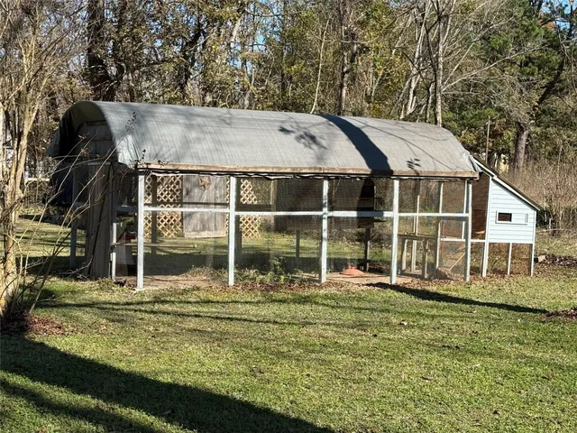 a view of a yard with an outdoor space