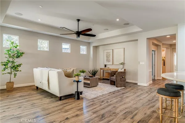 a view of a dining room kitchen counter top space and stainless steel appliances
