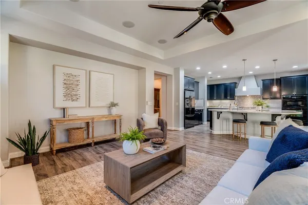 a kitchen with a refrigerator and a sink