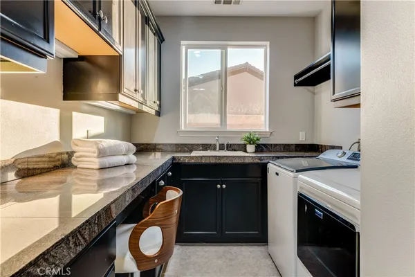 a picture of a bathroom with a shower