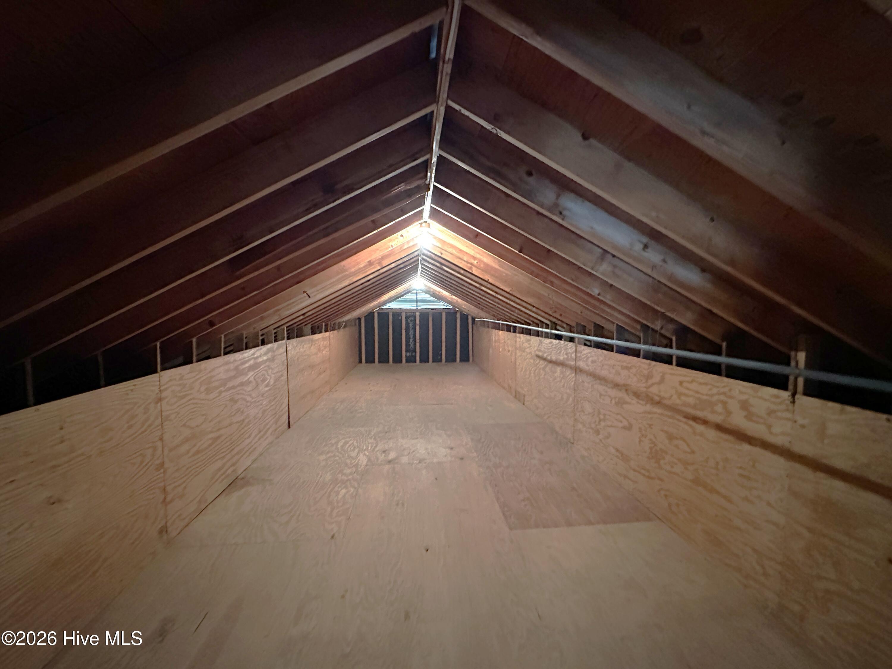 504 Pineview Road Clinton, NC 28328 - Photo 26 of 30 Lots of storage room in the walk-in floored attic above carport.