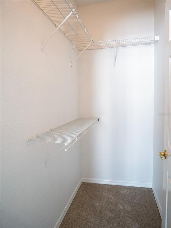 15473 Gulf Boulevard Madeira Beach, FL 33708 - Photo 24 of 41 a view of a room with racks on the wall