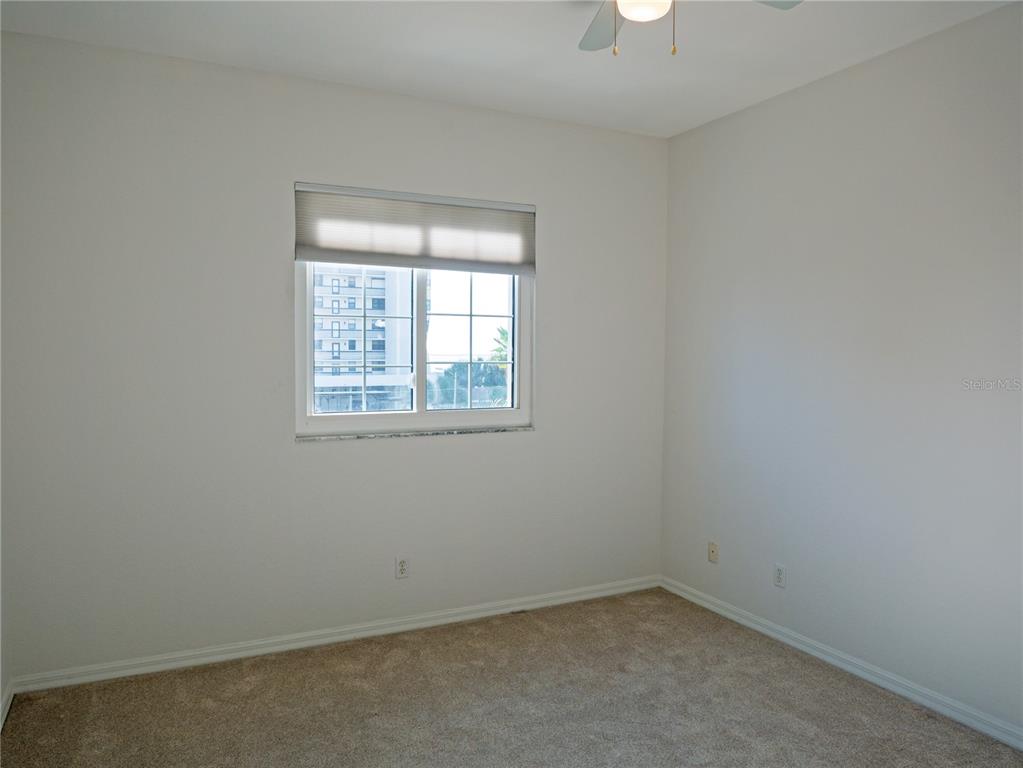 15473 Gulf Boulevard Madeira Beach, FL 33708 - Photo 30 of 41 an empty room with a window