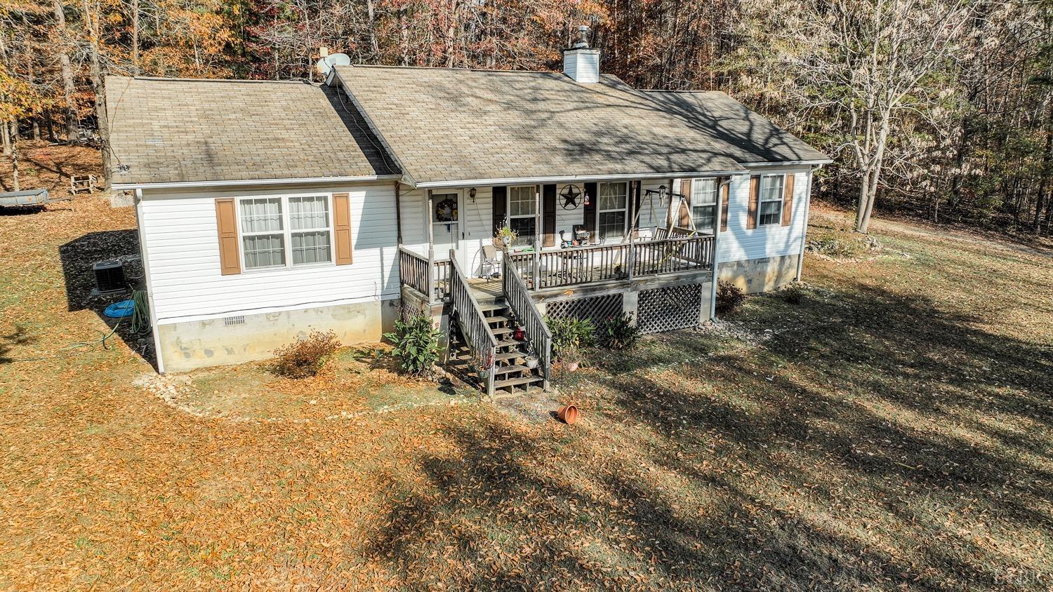 12098 Scuffletown Road Randolph, VA 23962 - Photo 1 of 30 front view of a house with a chairs