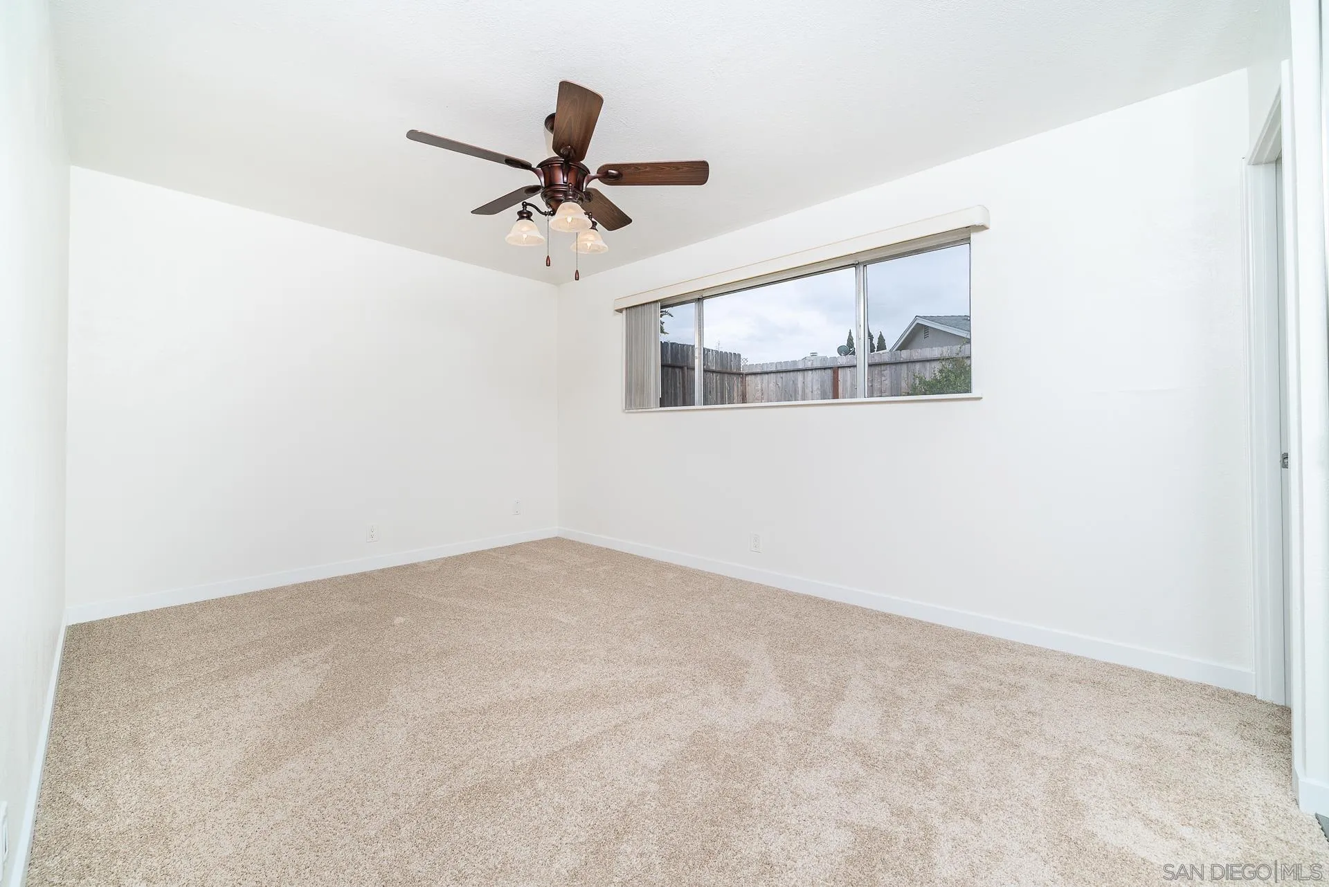 4047 Thomas Street Oceanside, CA 92056 - Photo 11 of 21 a view of a big room with wooden floor