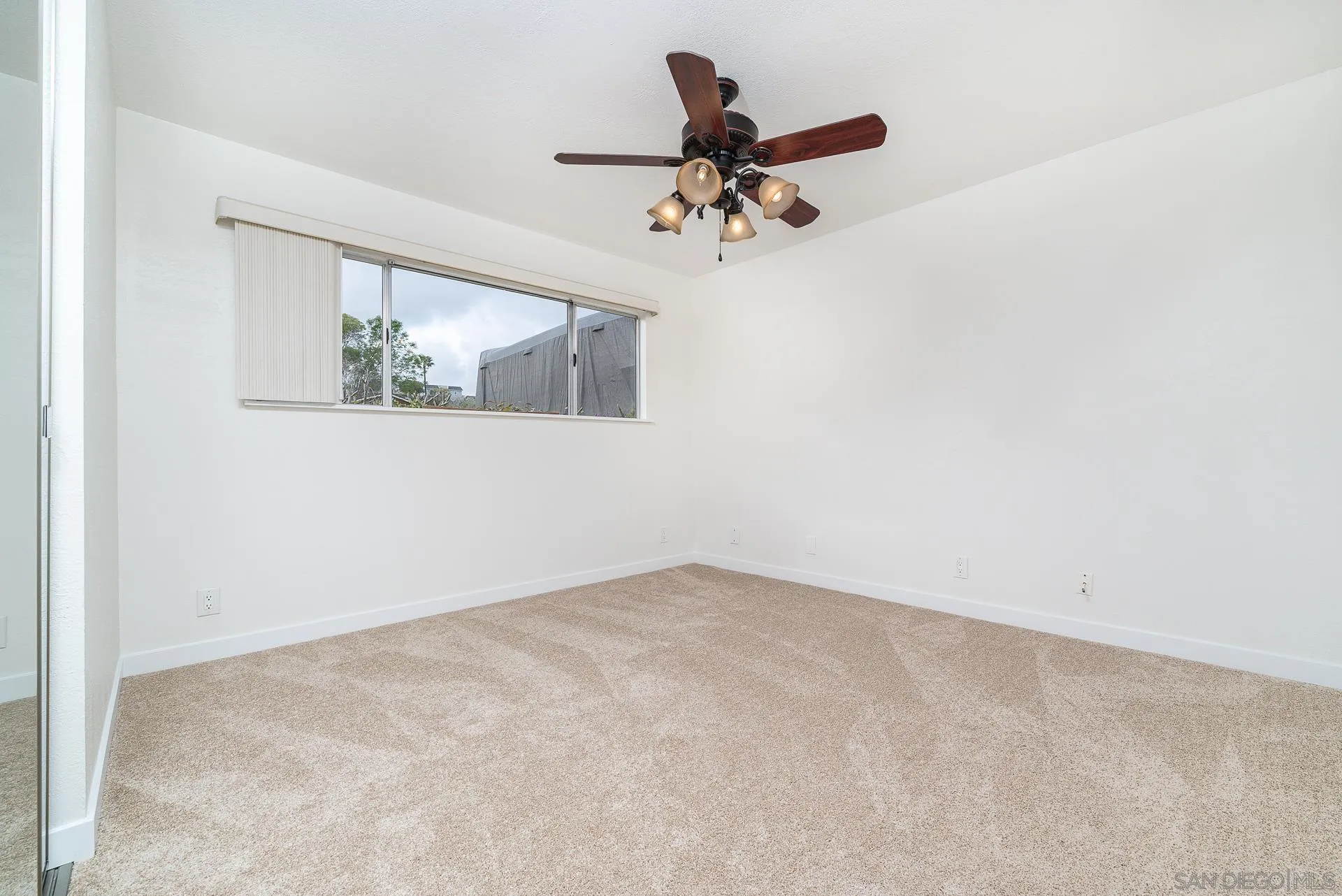 4047 Thomas Street Oceanside, CA 92056 - Photo 12 of 21 an empty room with a window