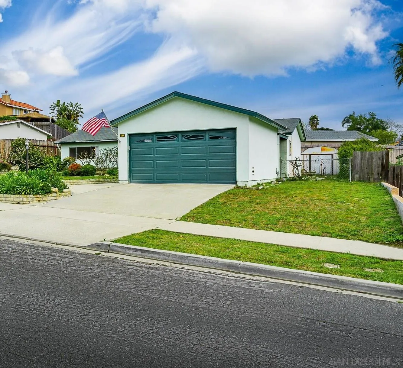 4047 Thomas Street Oceanside, CA 92056 - Photo 16 of 21 a view of a house with a yard and potted plants