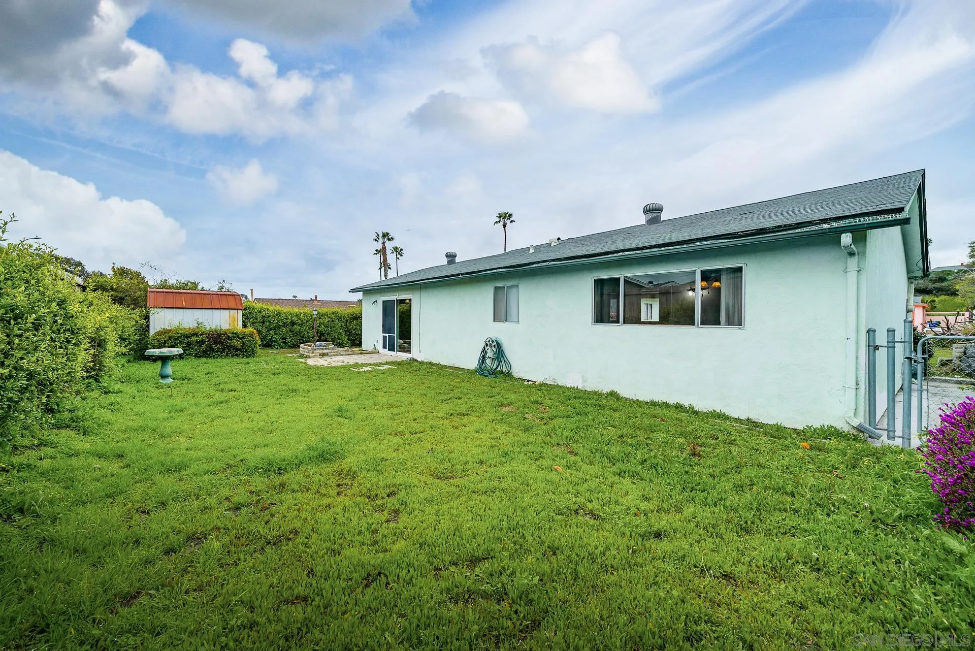 4047 Thomas Street Oceanside, CA 92056 - Photo 19 of 21 a front view of house with yard and trees