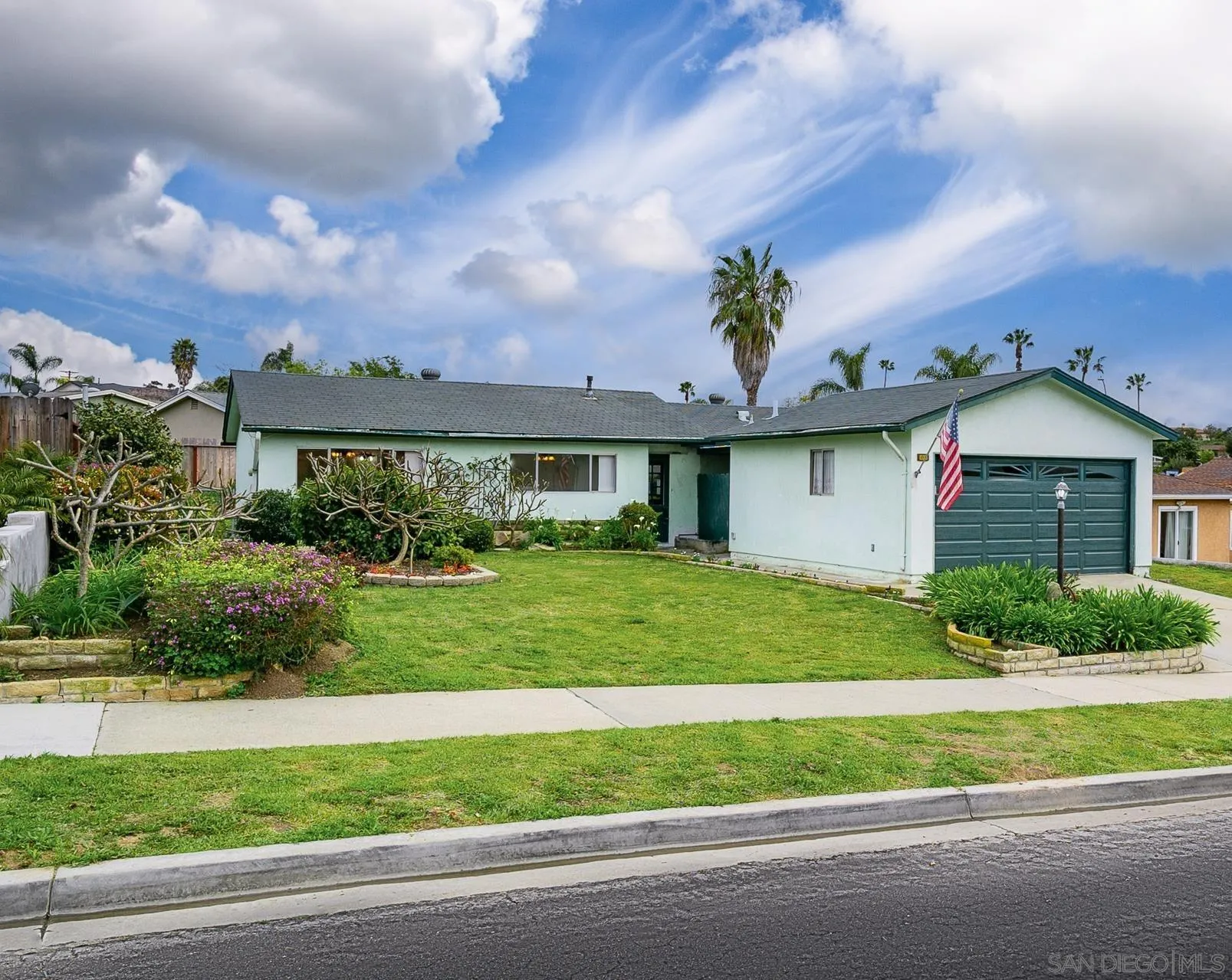4047 Thomas Street Oceanside, CA 92056 - Photo 2 of 21 a view of a house with a yard and plants