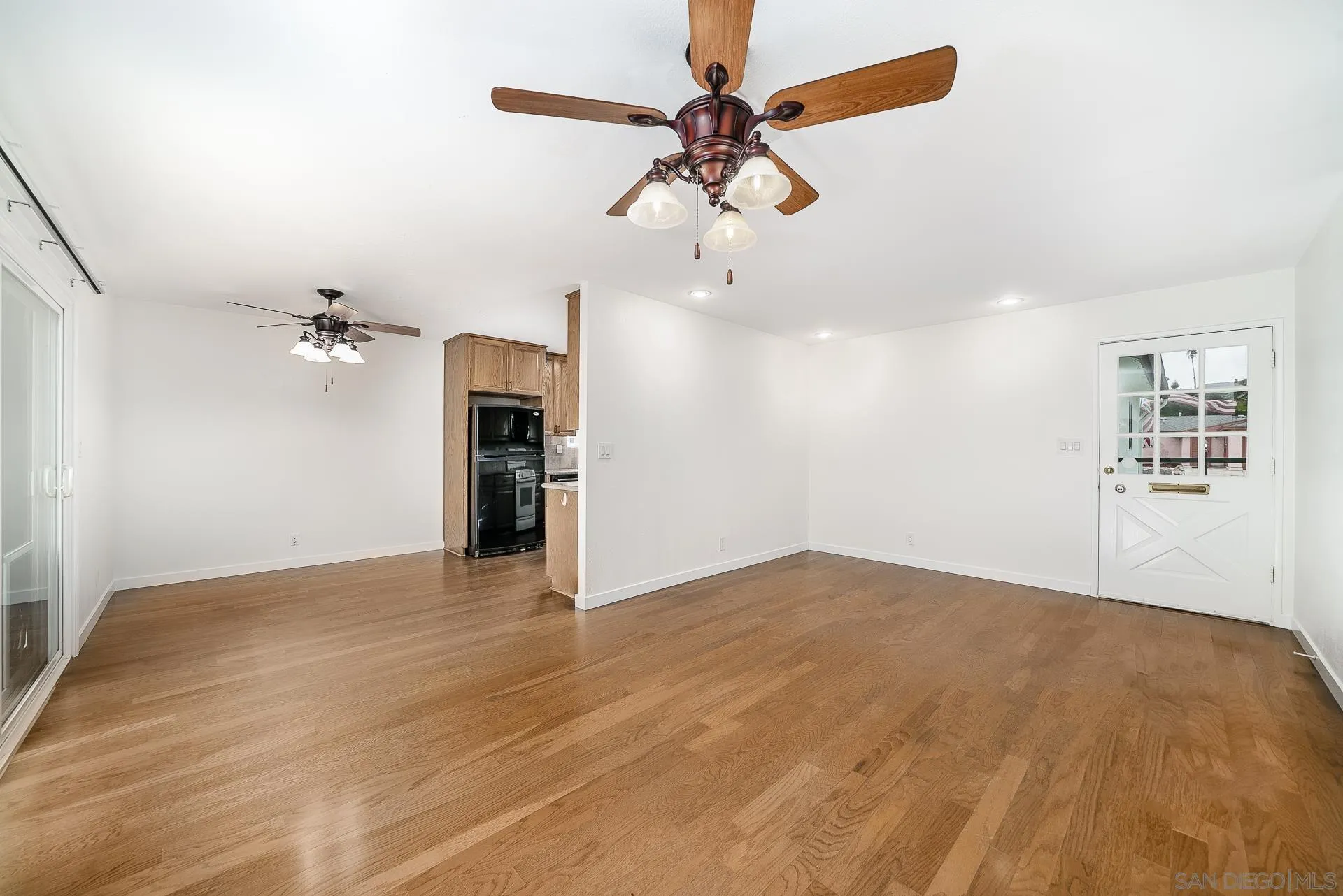 4047 Thomas Street Oceanside, CA 92056 - Photo 5 of 21 wooden floor in an empty room with a window