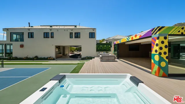 a view of a building with a swimming pool