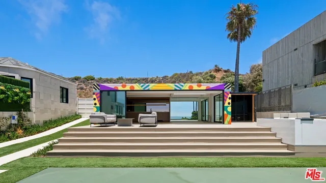 a view of a swimming pool and outdoor space