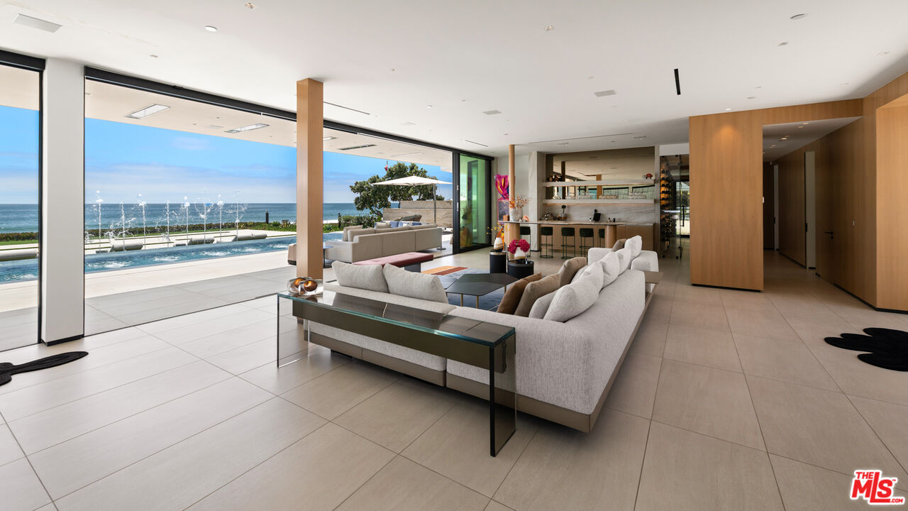 31100 Broad Beach Road Malibu, CA 90265 - Photo 6 of 38 a living room with furniture and a large window