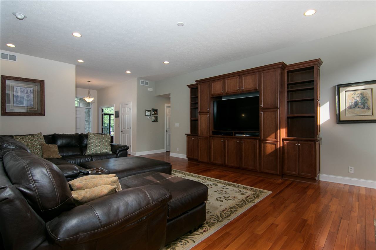 637 Roxbury Road Rockford, IL 61107 - Photo 11 of 25 a living room with furniture and a flat screen tv