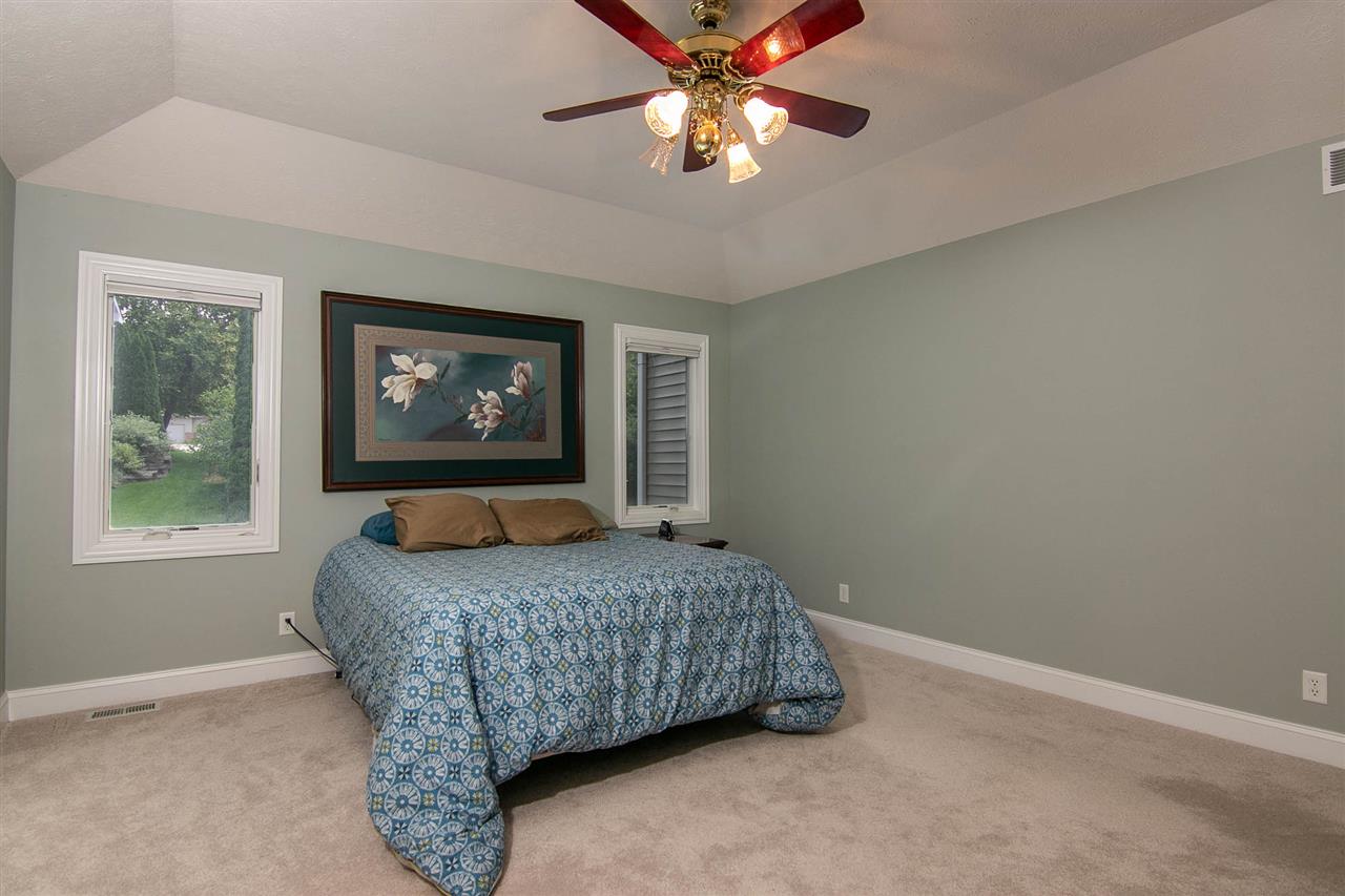 637 Roxbury Road Rockford, IL 61107 - Photo 15 of 25 a bedroom with a bed and a window