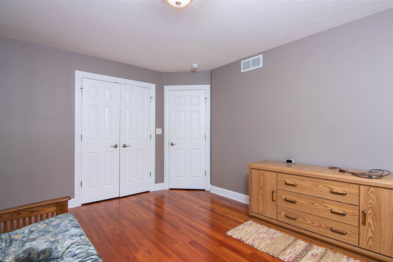 637 Roxbury Road Rockford, IL 61107 - Photo 17 of 25 a view of a dresser with wooden floor