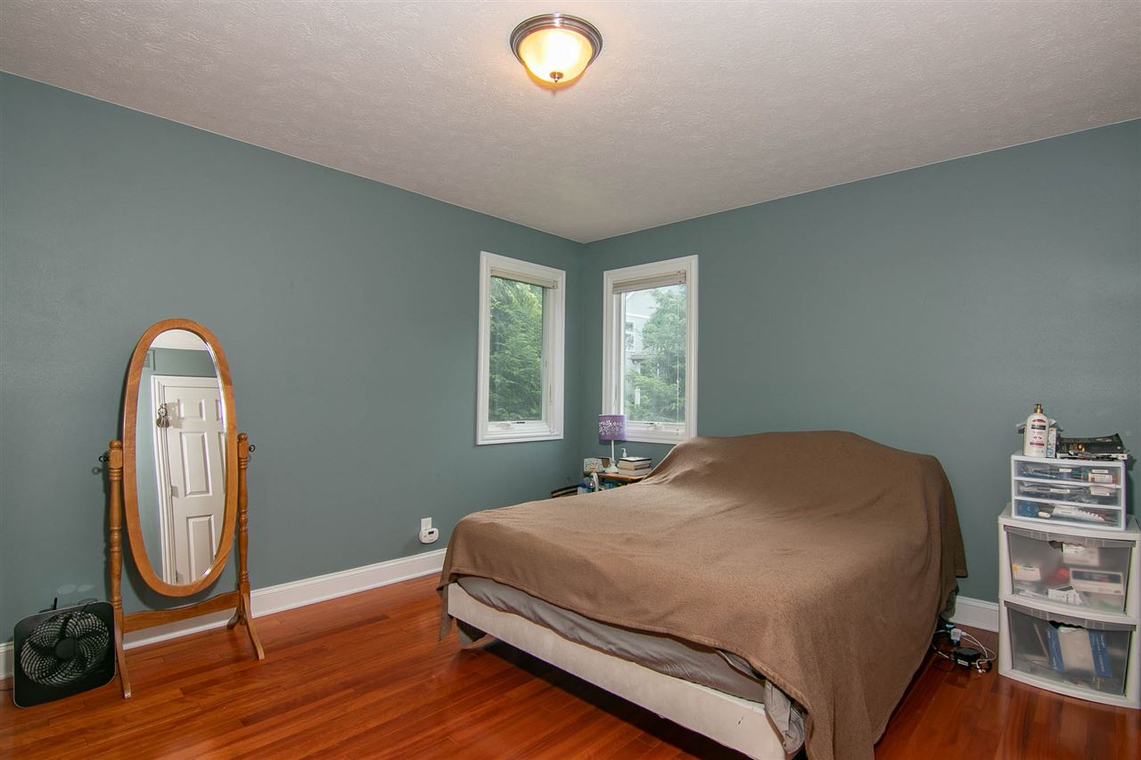 637 Roxbury Road Rockford, IL 61107 - Photo 19 of 25 a bedroom with a bed and a window