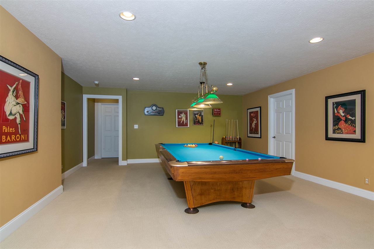 637 Roxbury Road Rockford, IL 61107 - Photo 23 of 25 a room with pool table and a chandelier