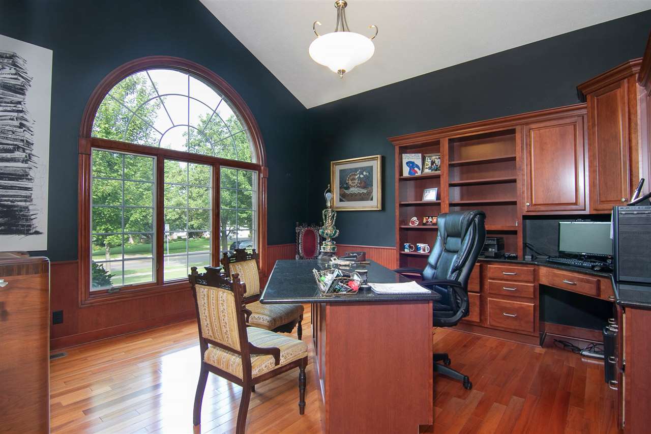 637 Roxbury Road Rockford, IL 61107 - Photo 24 of 25 a view of a livingroom with furniture window and wooden floor