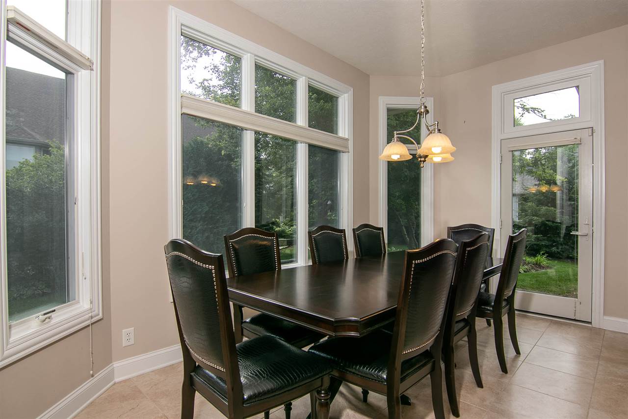 637 Roxbury Road Rockford, IL 61107 - Photo 6 of 25 a dining room with furniture and window