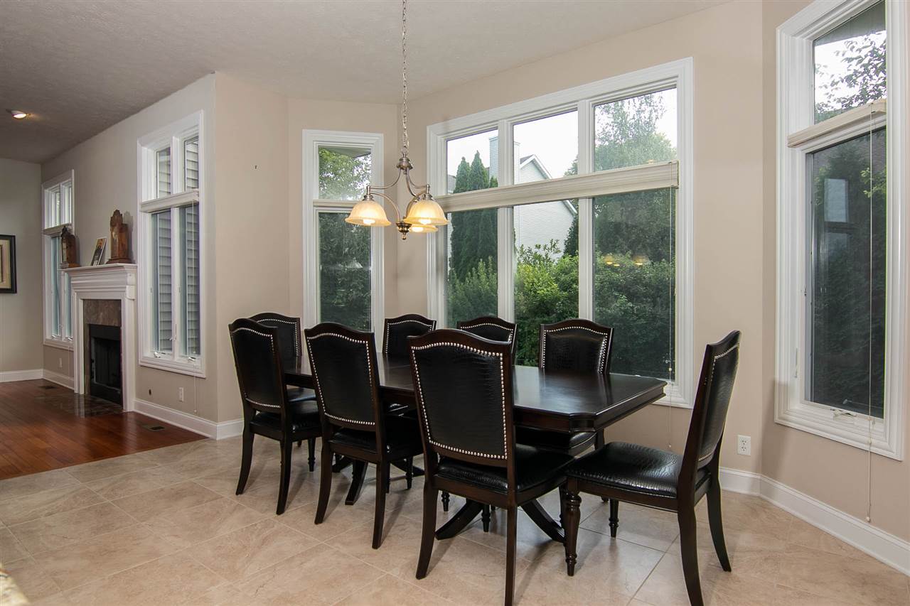 637 Roxbury Road Rockford, IL 61107 - Photo 7 of 25 a view of a dining room with furniture window and outside view