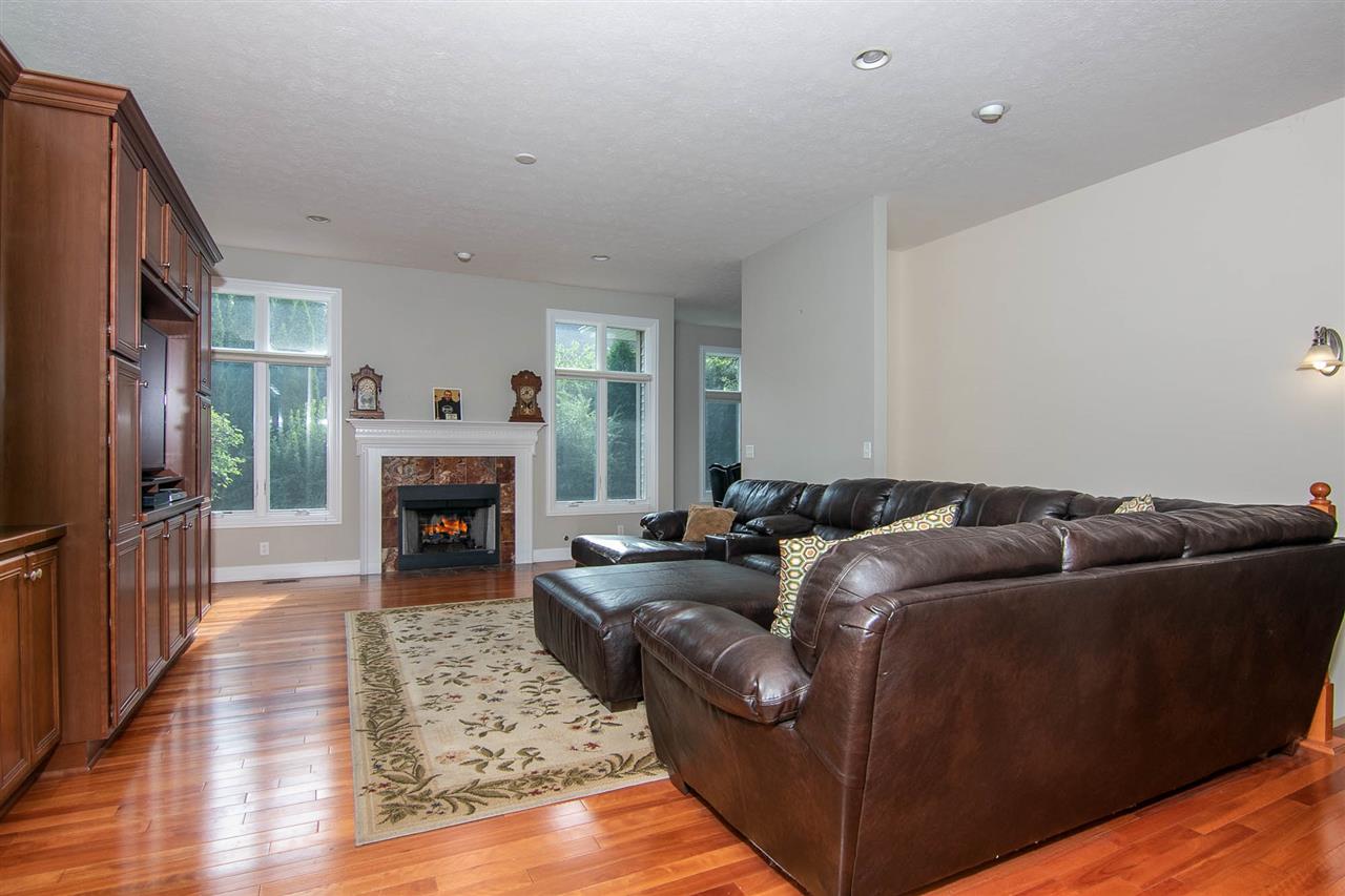 637 Roxbury Road Rockford, IL 61107 - Photo 10 of 25 a living room with furniture and a fireplace