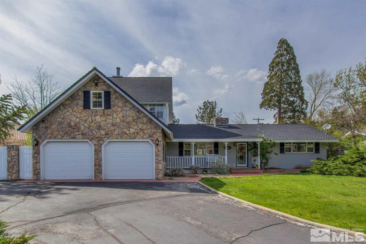5155 Canyon Drive Reno, NV 89519 - Photo 1 of 1 a front view of a house with a yard
