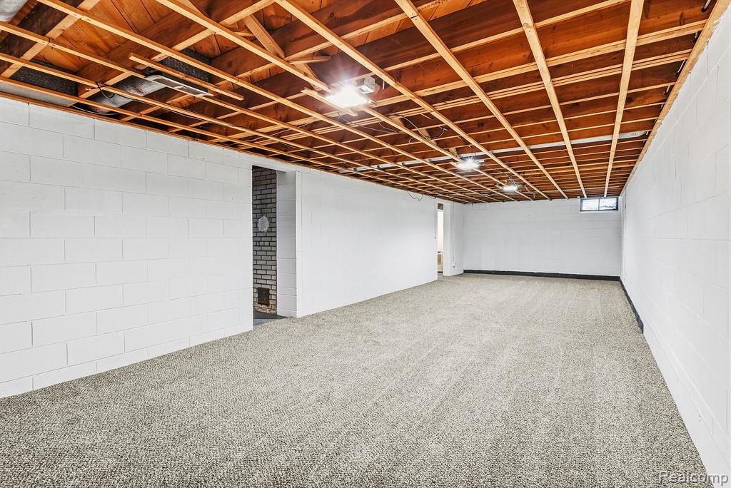 3485 Hammerberg Road Flint, MI 48507 - Photo 29 of 35 Basement featuring carpet floors