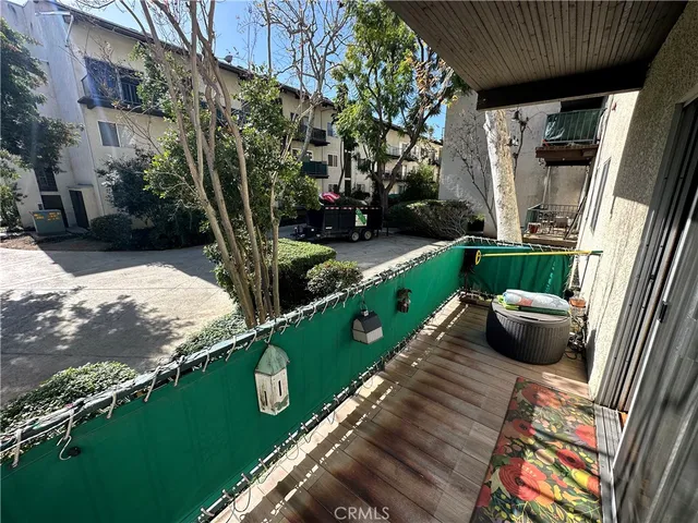 a view of swimming pool from a balcony