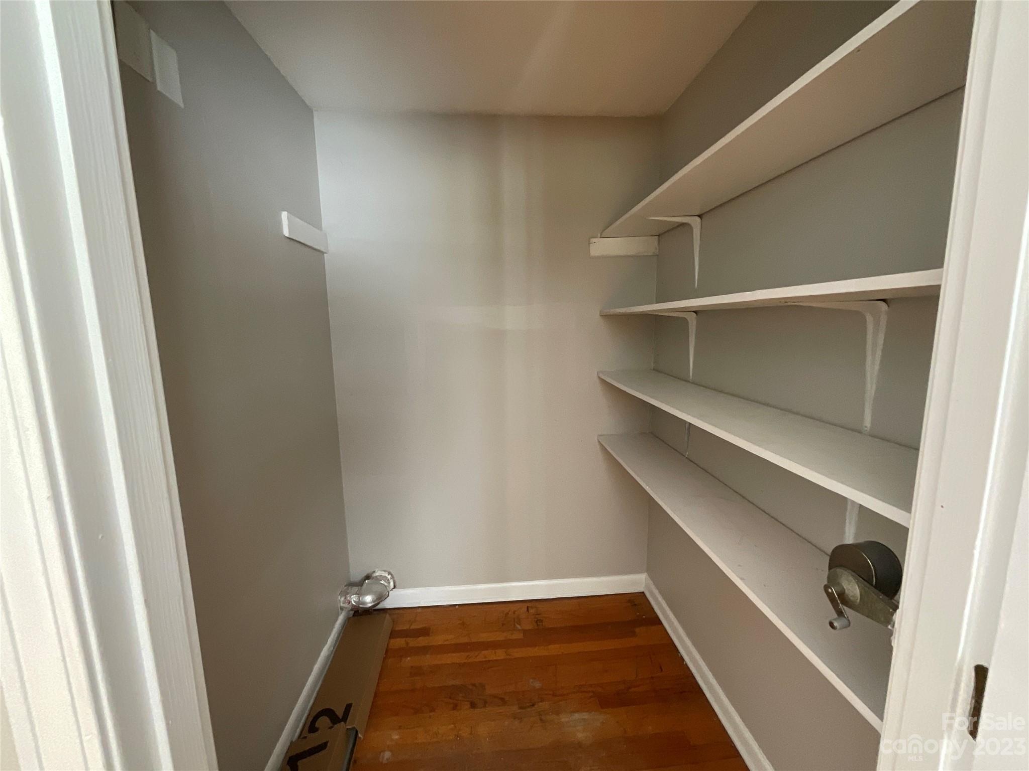 1285 Rainbow Circle Catawba, SC 29704 - Photo 11 of 22 a view of walk in closet with empty racks