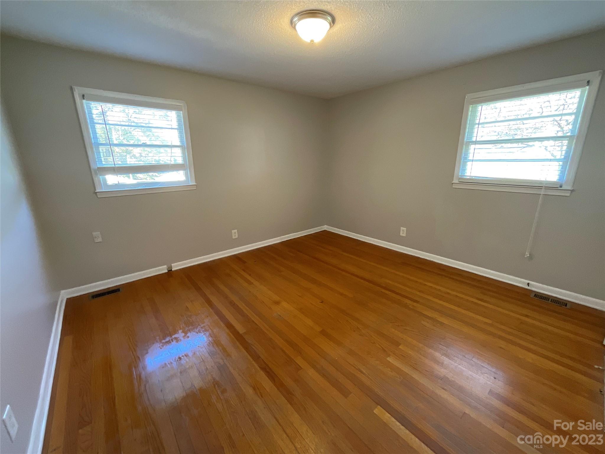1285 Rainbow Circle Catawba, SC 29704 - Photo 15 of 22 a view of empty room with wooden floor and fan